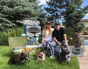 Laura and Gary pose in front of their cooler pads.