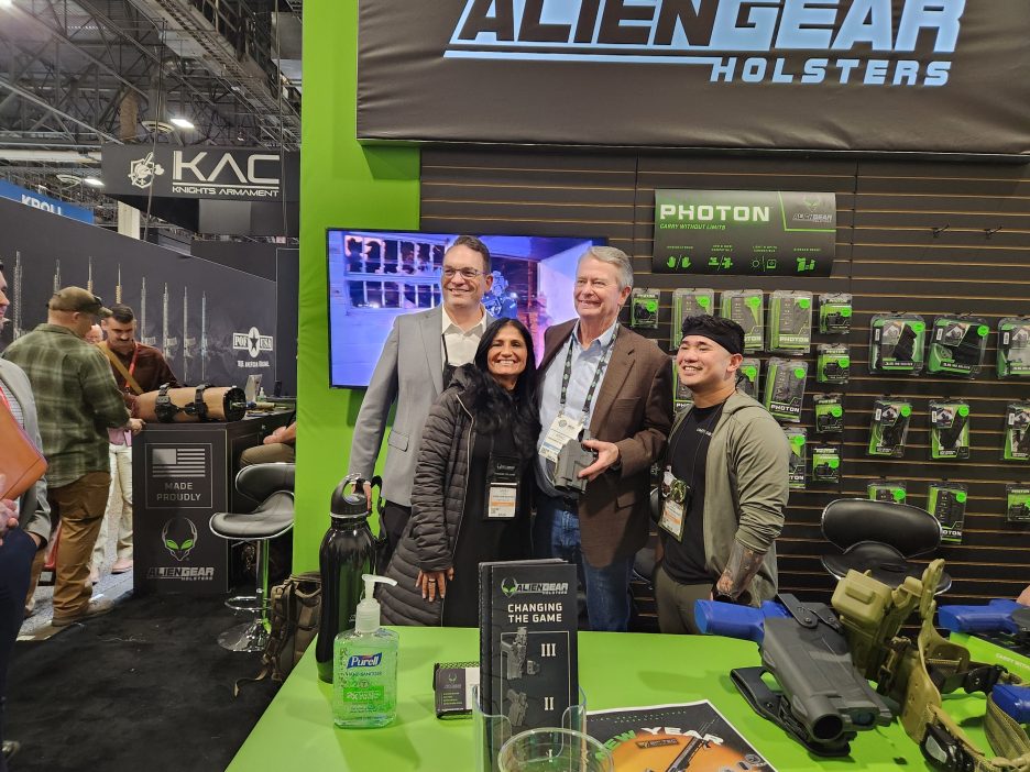 Gov. Brad Little poses with SHOT Show attendees