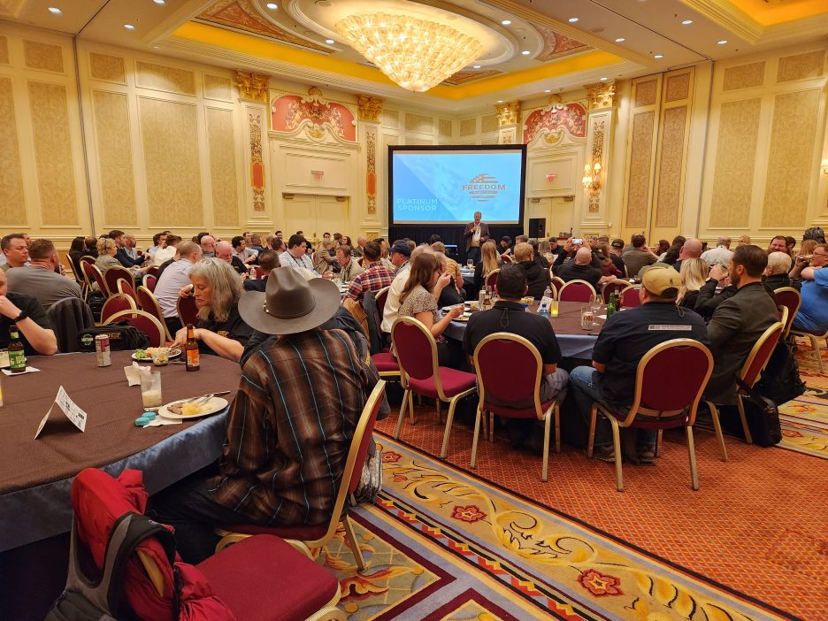 SHOT Show attendees at tables at the Idaho Reception